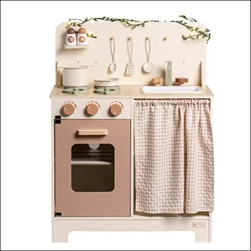 Cocina de Pueblo Tradicional con cocinitas de madera y horno rosa decorativo